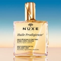 Nuxe-Huile-Prodigieuse-suchy-olejek-do-twarzy-ciala-i-wlosow-50-ml-PROMO.webp